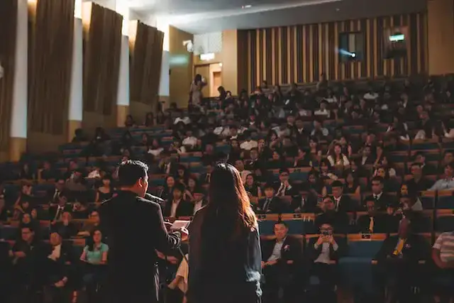 Photo of people in an auditorium