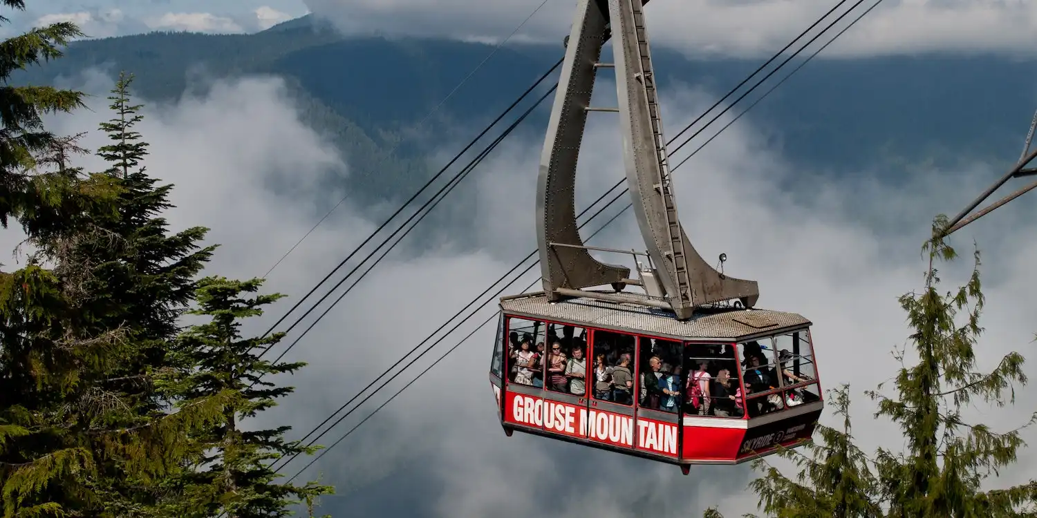 A cable car going up a mountain