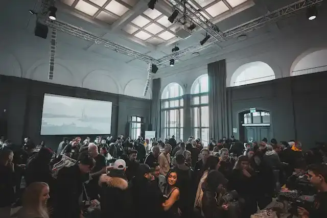 Photo of people in a hall