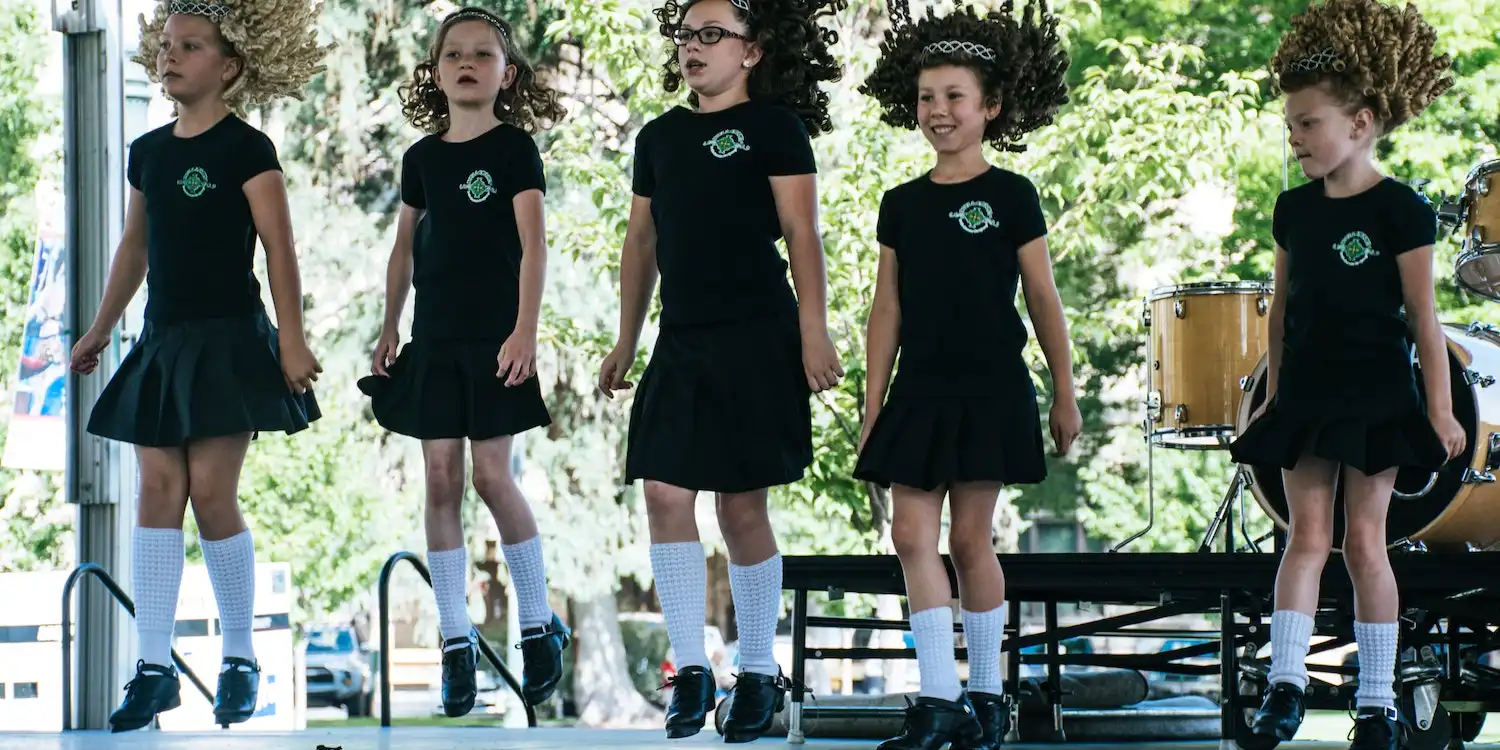 Photo of litte school children dancing